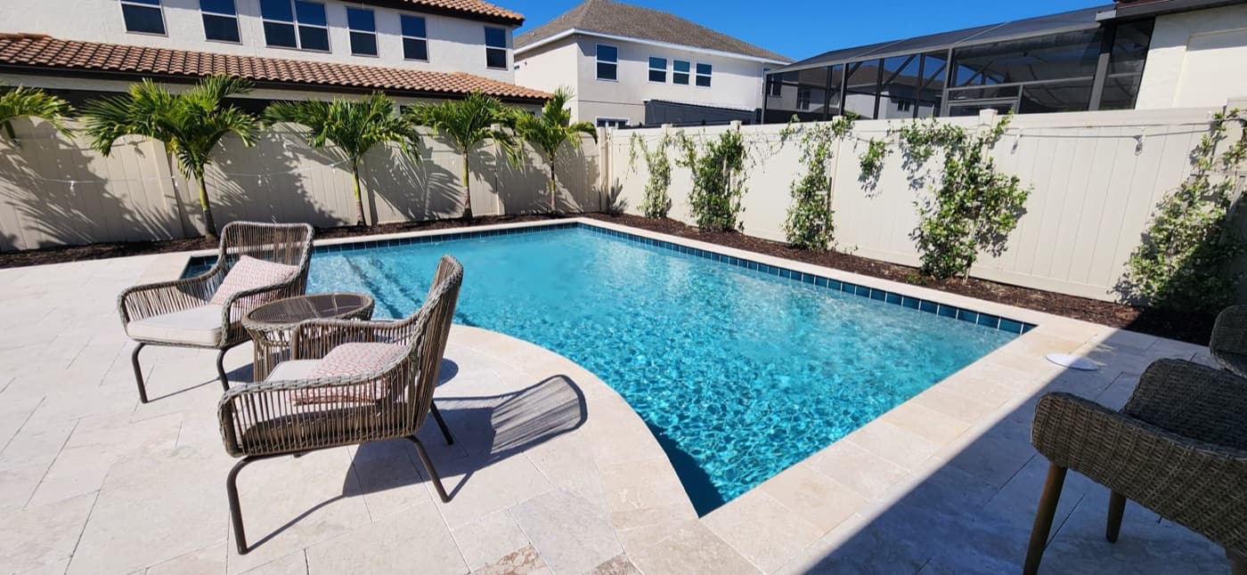 Travertine Deck — custom pool by Grunit